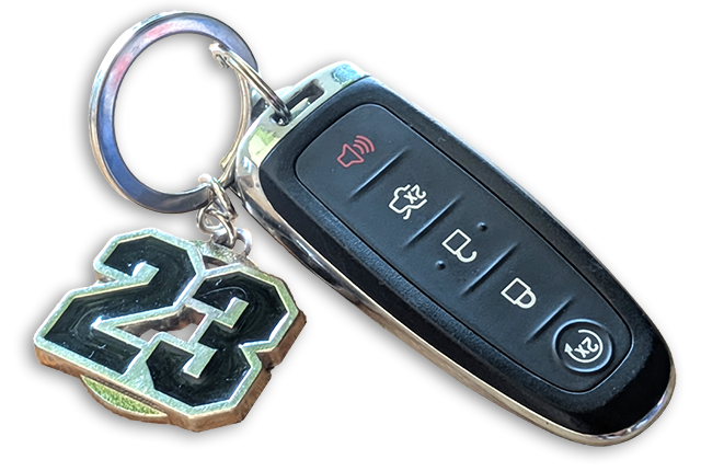 Remote Ford car key on ornamental numbered keychain